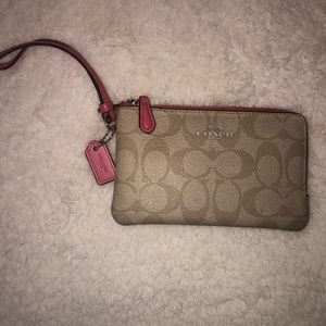 Bring anywhere Coach Wristlet!